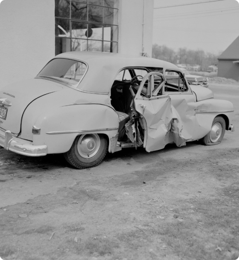 man-sitting-on-couch-deep-in-thought